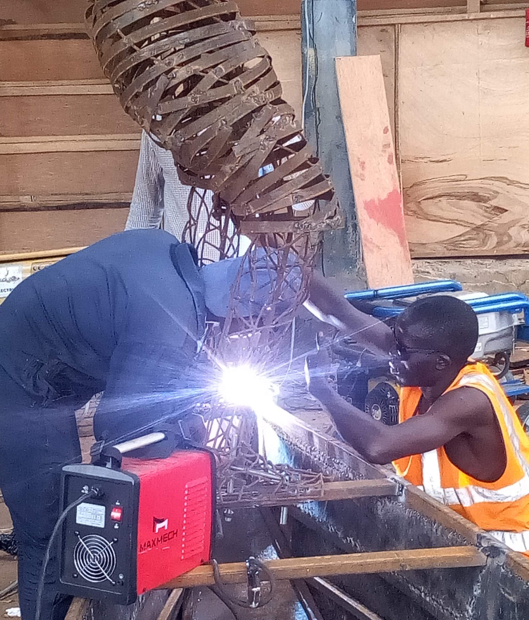 Fishing in the Sky: welding the steel frame.